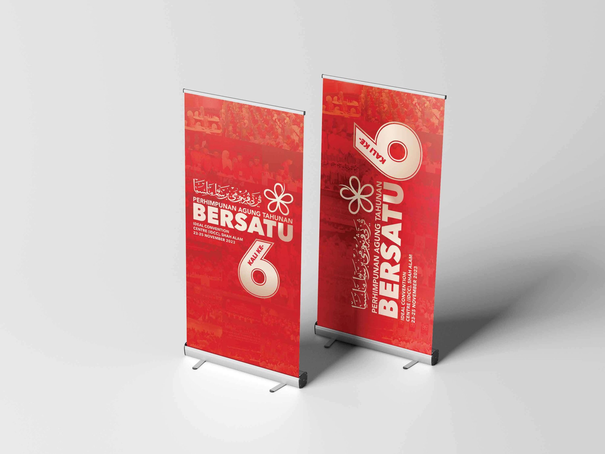 Two red roll-up banners